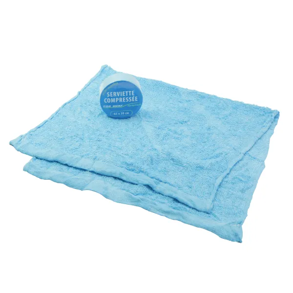 Product BLUE COMPRESSED TOWEL, Ø 6 cm > 65 x 30 cm Image