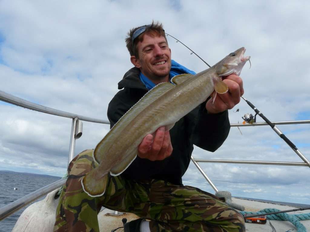 Vincent et une belle julienne prise en pêche à gratter